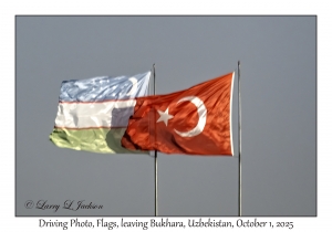 2025-10-01#2778 Driving Photo, Flags, leaving Bukhara, Uzbekistan