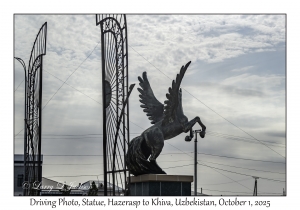 2025-10-01#2975 Driving Photo, Statue, Hazerasp to Khiva, Uzbekistan